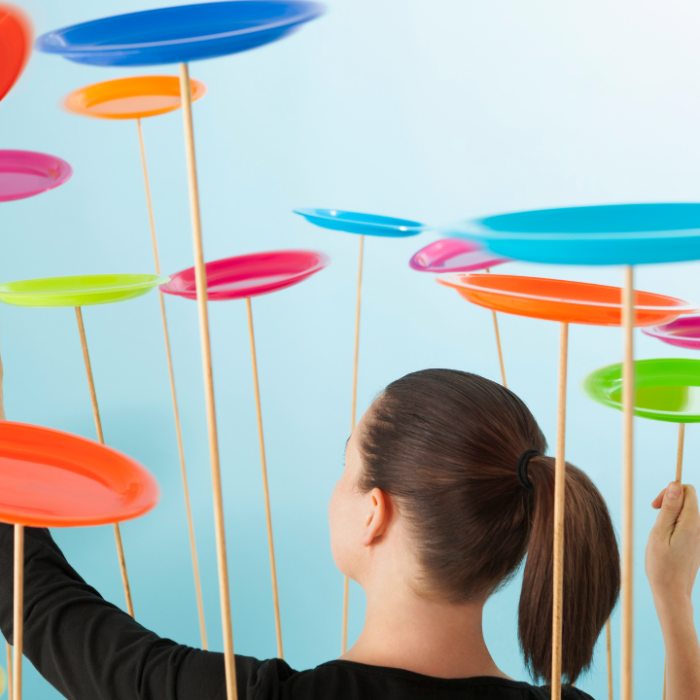 Image of women spinning plates